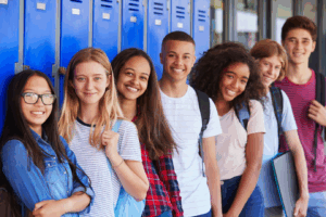 Organizing-My-Community-Cover Diverse dtudents standing in front of blue lockers